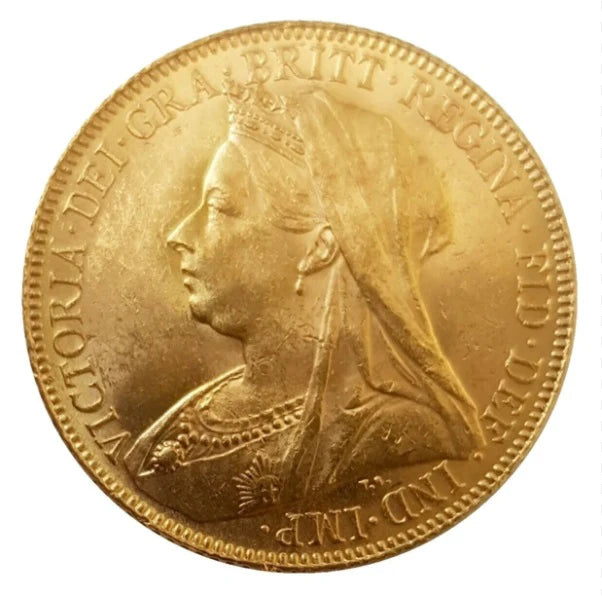 British Sovereign Gold Coin showcased with other rare pieces